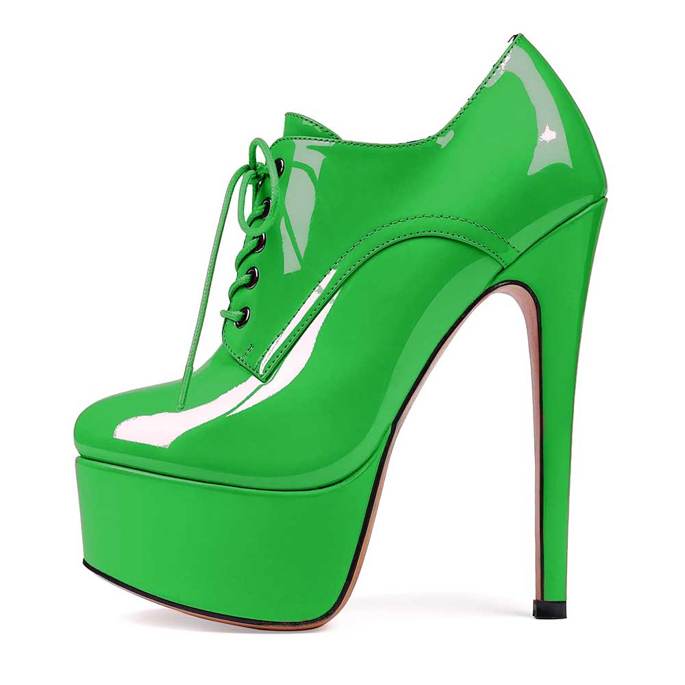 Green high heel platform ankle boots with lace-up design and glossy finish