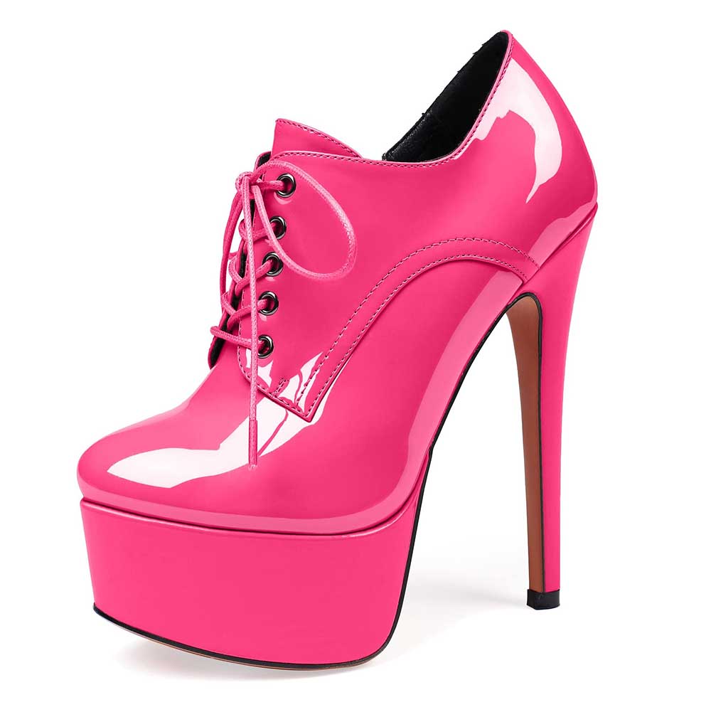 Pink high-heeled ankle boot with platform and lace-up front for women
