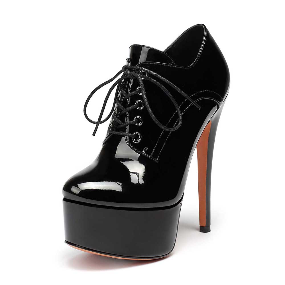 Black round toe booties for women with high platform heel and lace-up design