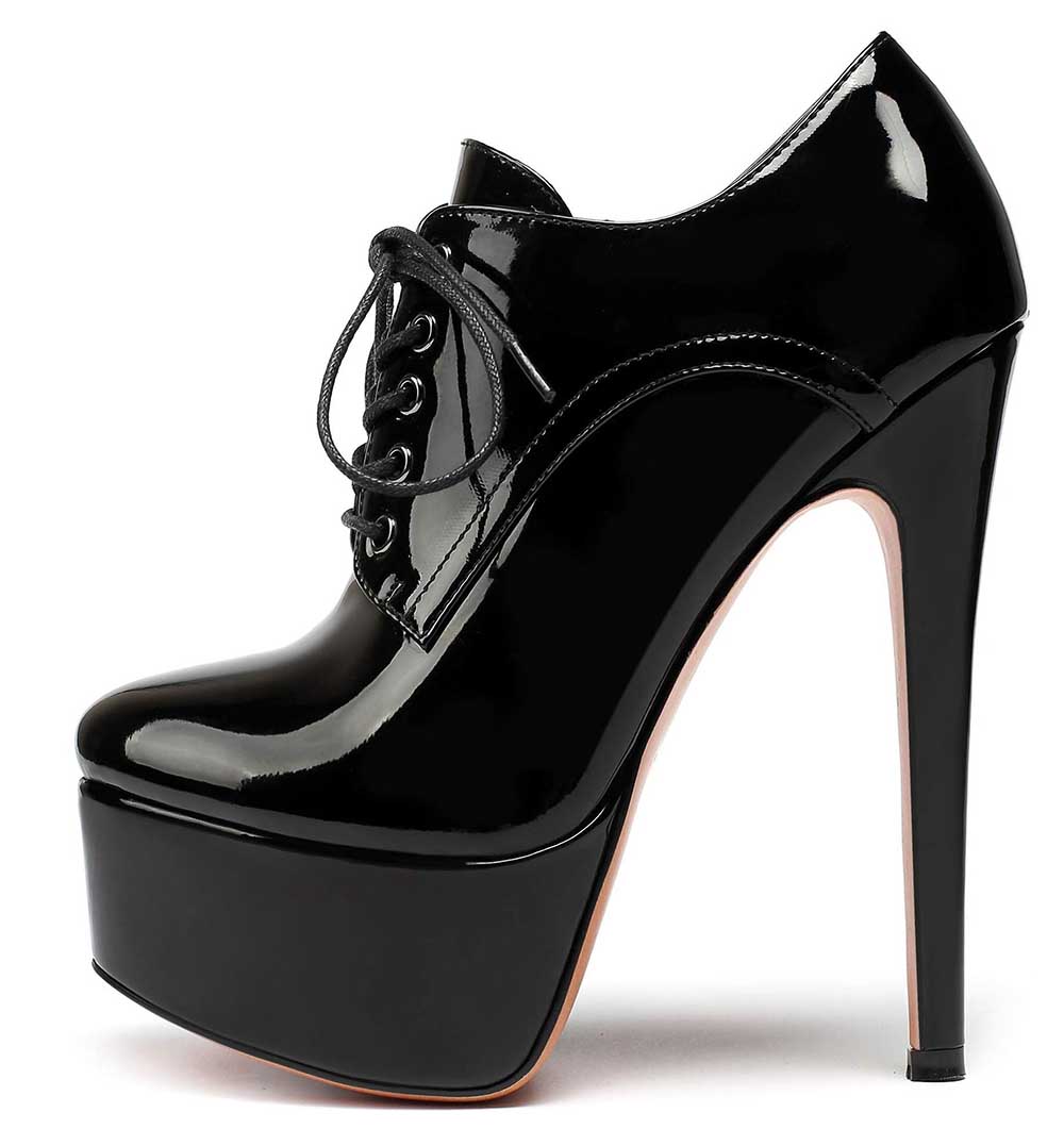 Black round toe booties for women with high stiletto heel and platform sole in shiny patent finish