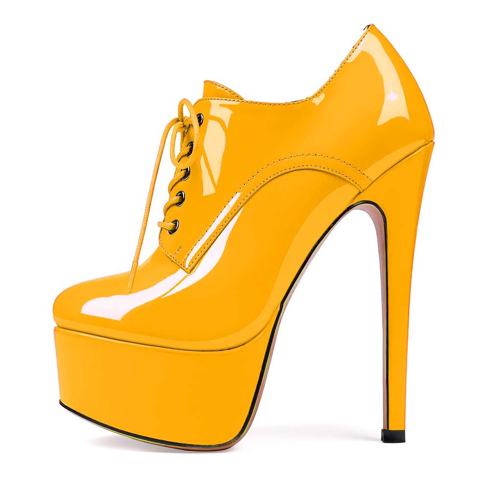 Yellow high heel platform ankle boots with lace-up design for fashion women