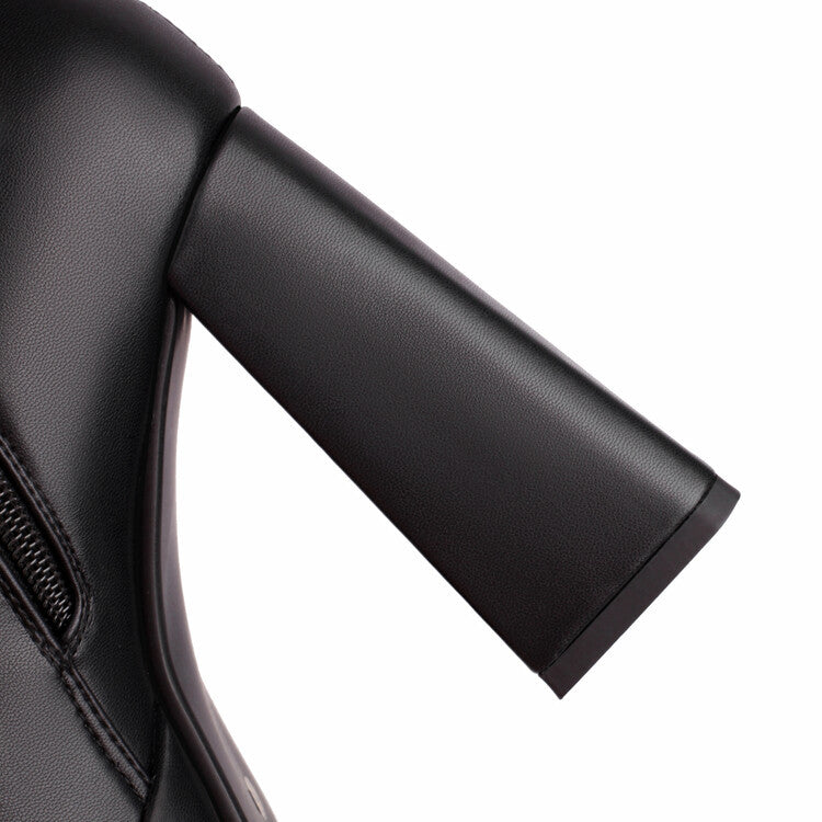 Close-up of black leather chunky heeled boots for women showing block heel detail
