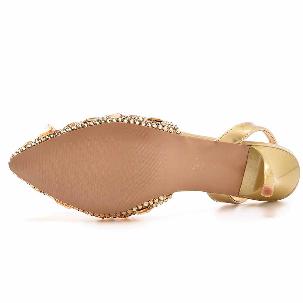 Bottom view of Crystal Queen crystal embellished low heels with gold finish and decorative stones