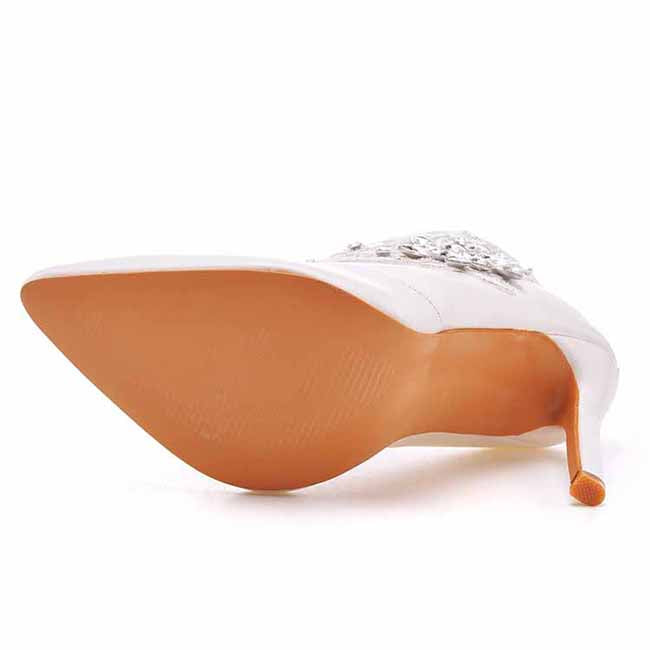 white lace wedding boots for bride with pointed toe and high heel sole