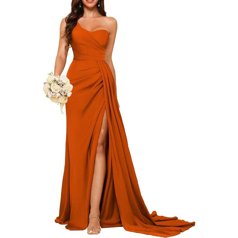 Elegant orange one shoulder bridesmaid dress with side slit and flowing train holding bouquet
