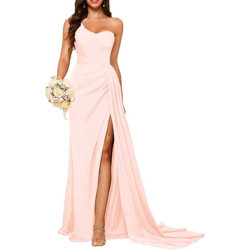 Light pink prom dress featuring a one shoulder bridesmaid dress design with a thigh-high slit