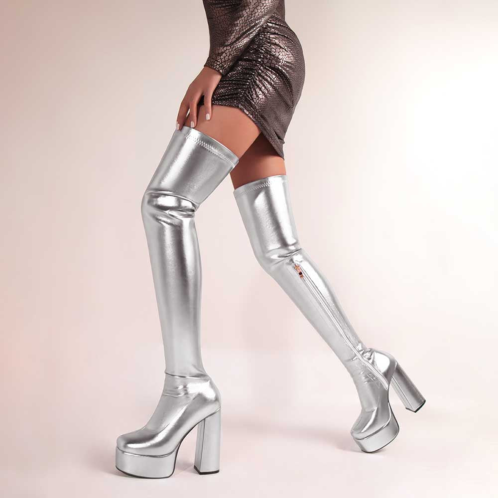 Shiny faux leather boots women in silver thigh-high design with block heels and platform soles