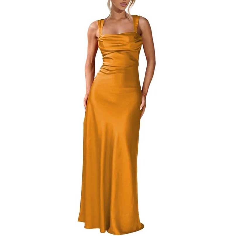 Mustard yellow spaghetti strap bridesmaid gown with fitted bodice and flowing skirt prom dress