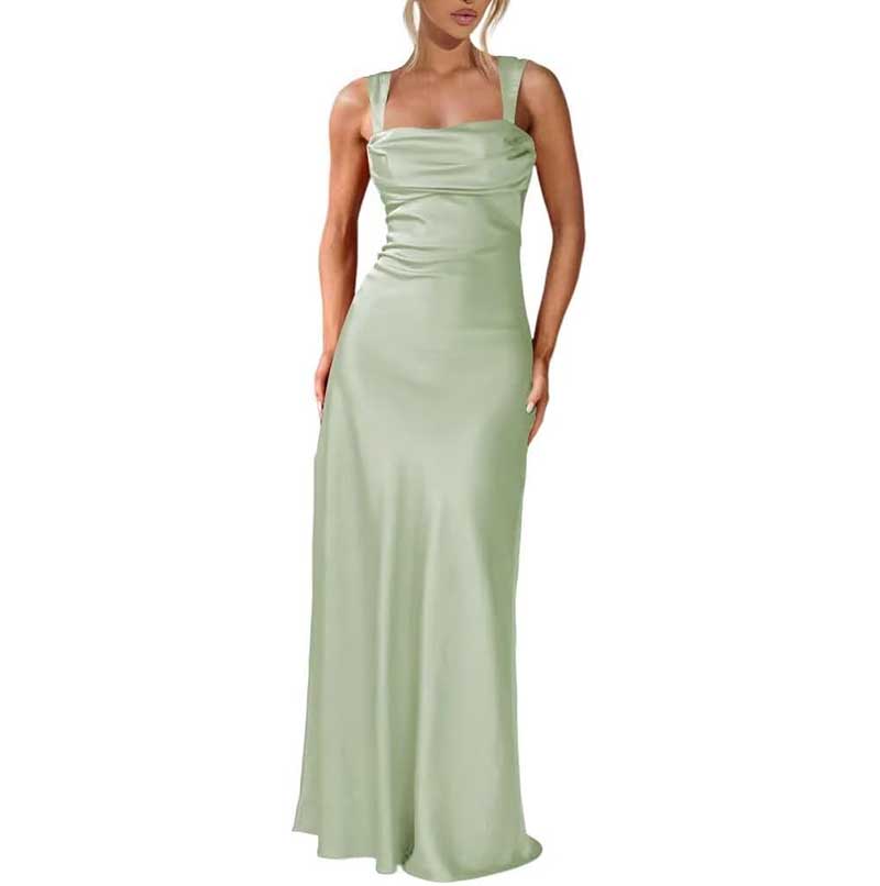 Elegant light green spaghetti strap bridesmaid gown with a fitted bodice and flowing skirt
