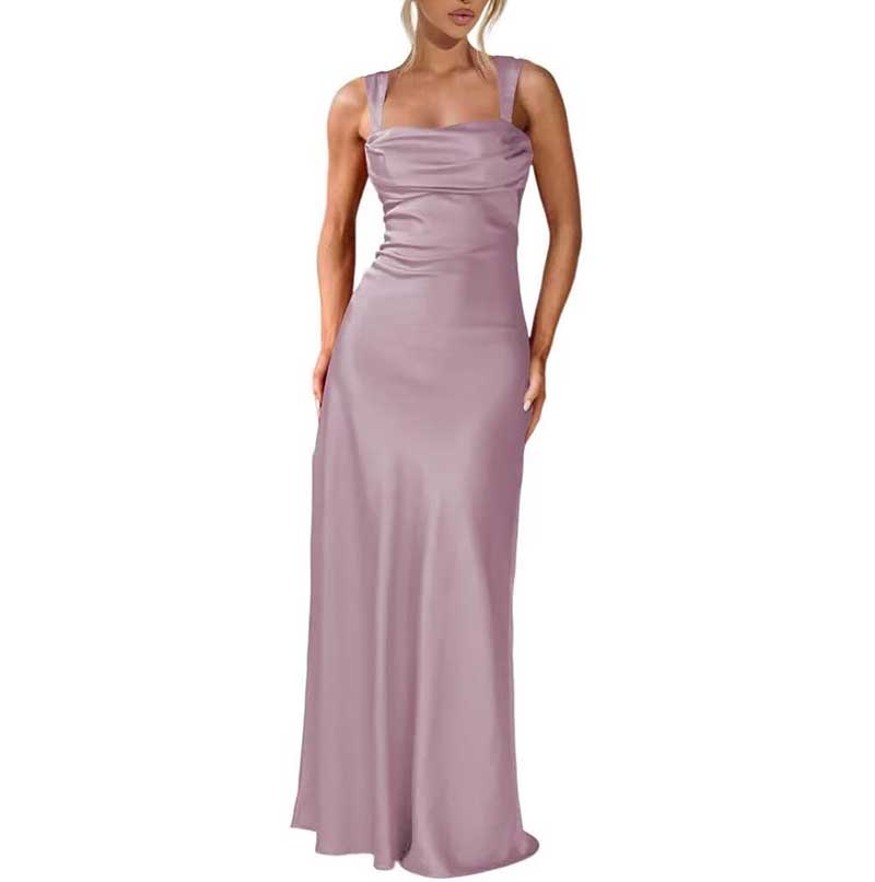 Lavender spaghetti strap bridesmaid gown with a fitted bodice and flowing floor-length skirt