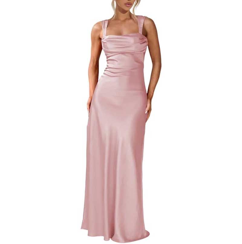 Elegant pink spaghetti strap bridesmaid gown with a fitted bodice and flowing skirt