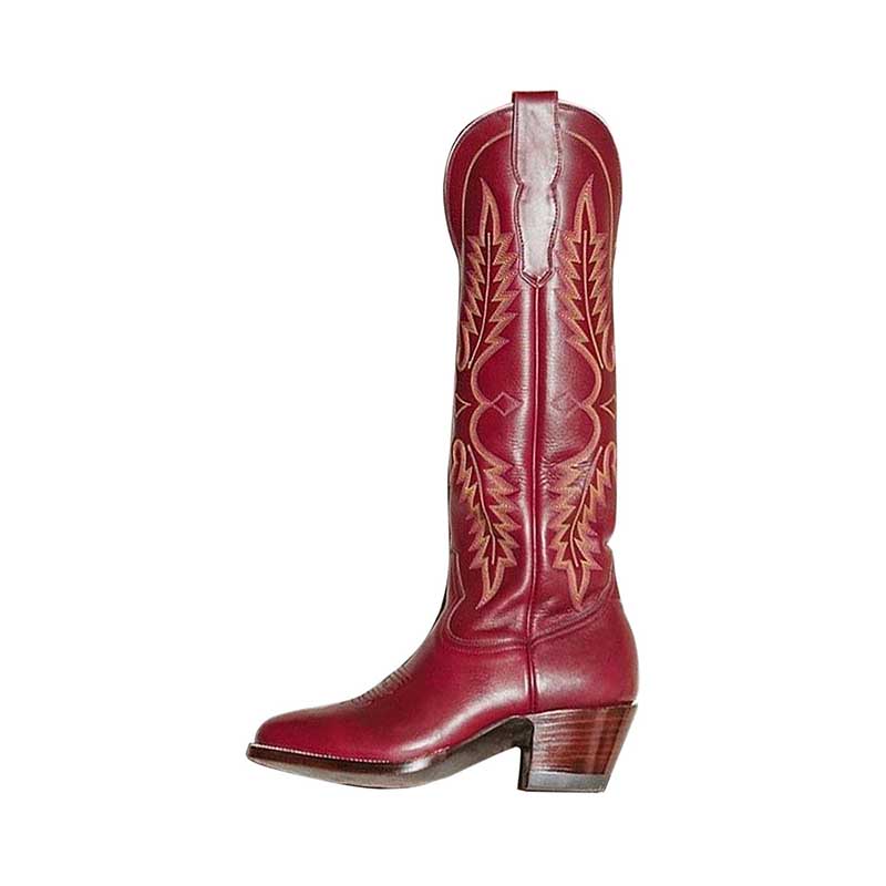 Vintage knee high cowboy boots in rich red leather with detailed stitching and stacked wooden heel