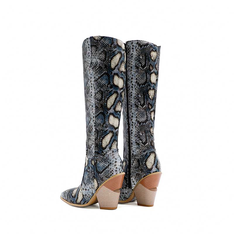 Snake print knee-high western wedding guest boots with stacked wooden heels