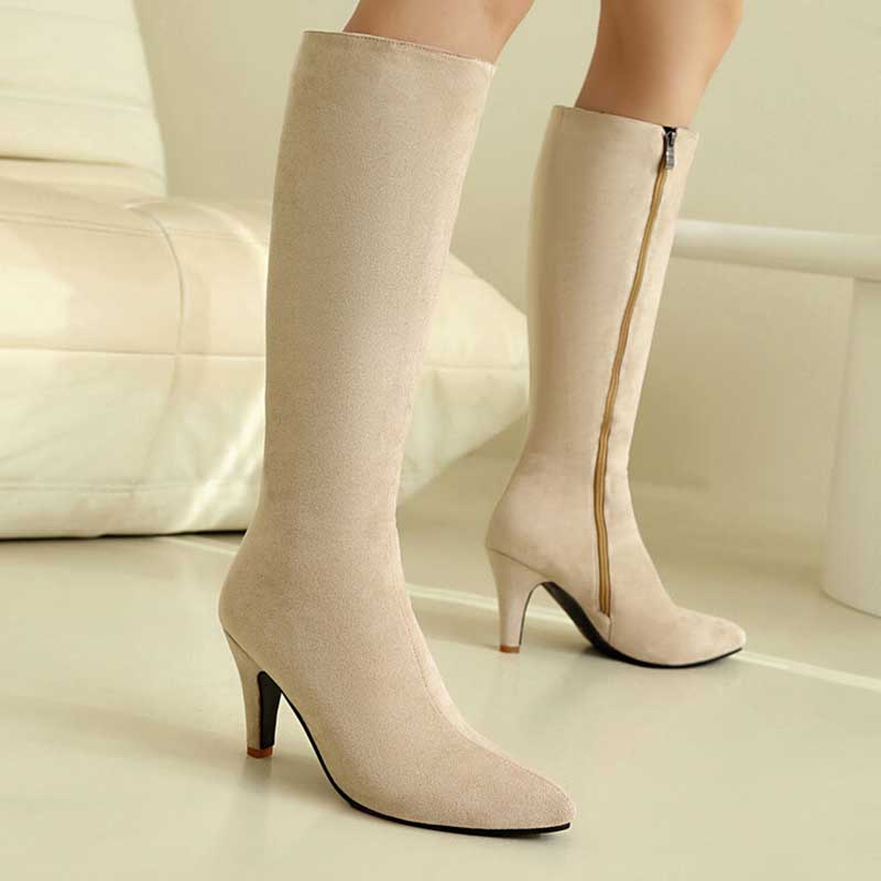 Beige women's suede knee-high boots with pointed toe and mid-height heel featuring side zipper
