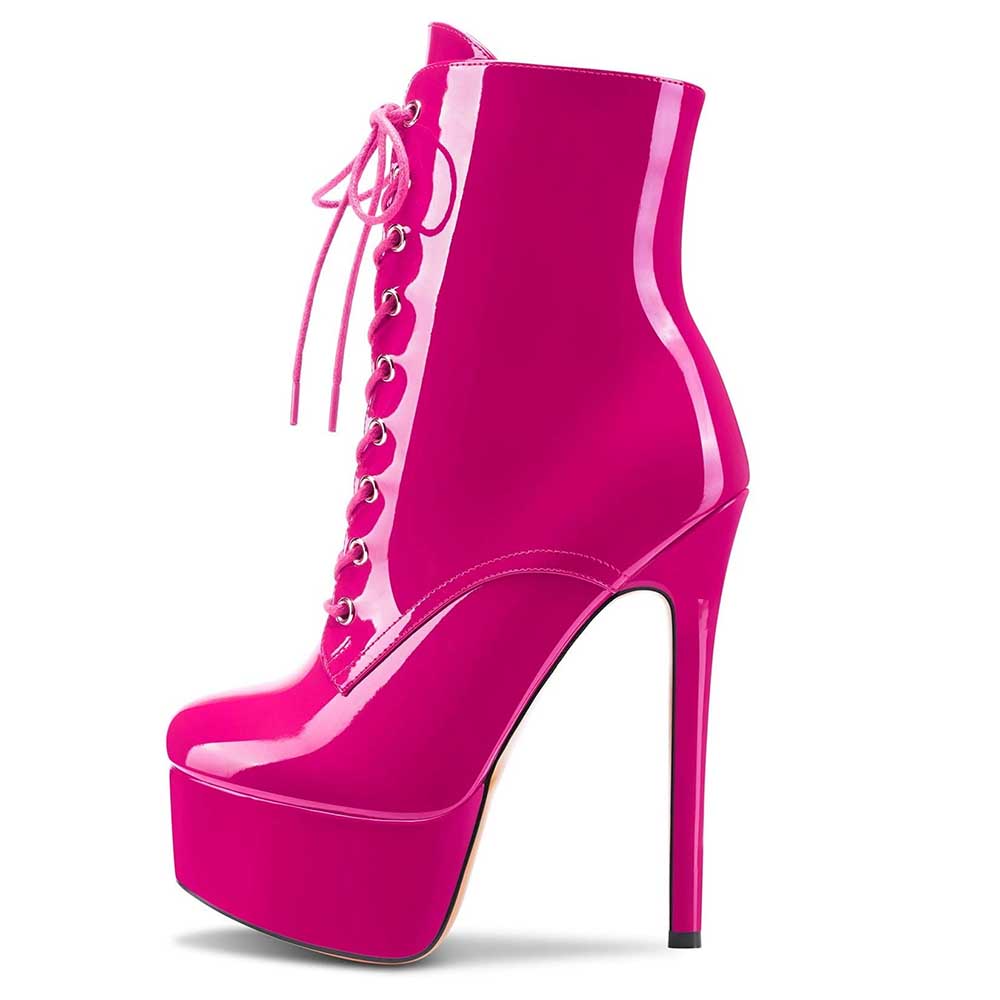 Bright pink women's patent leather stiletto boots with lace-up front and high platform ankle design