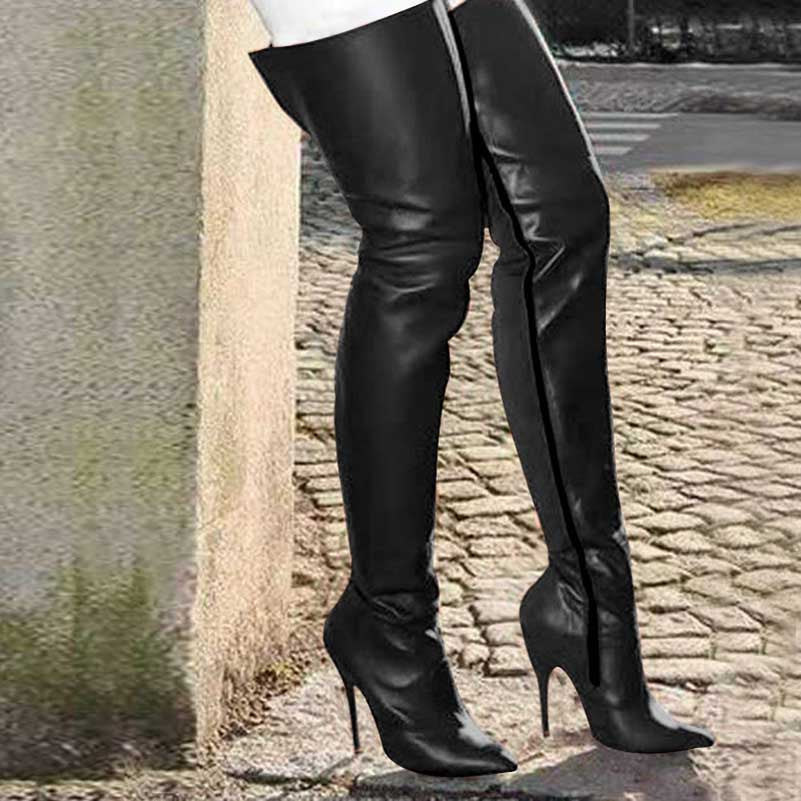 Black zipper long party boots for women with high heels and pointed toes on cobblestone street