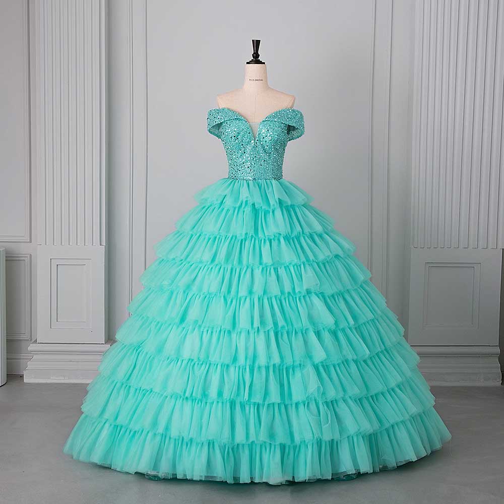Ball Gown in turquoise with off-shoulder design and ruffled layers, perfect for formal occasions.