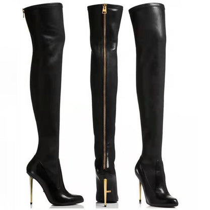 Black pointed toe over-the-knee boots with gold high heels and back zipper detailing