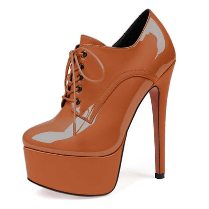 Brown high platform ankle boot with lace-up front and glossy finish black round toe booties for women