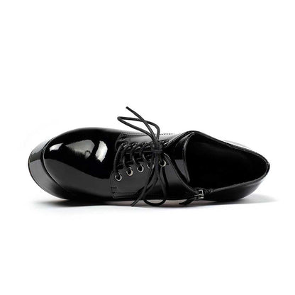 Shiny black round toe booties for women with lace-up design and smooth finish