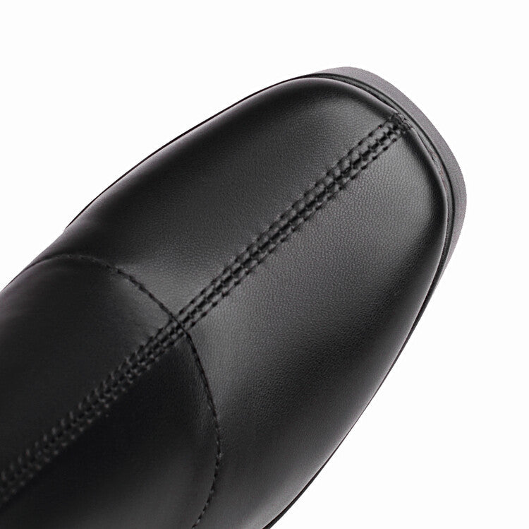 Close up of black leather chunky heeled boots for women with detailed stitching on toe