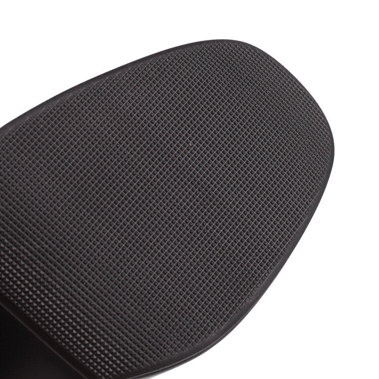 Close-up of black sole texture on chunky heeled boots for women showing detailed grip pattern