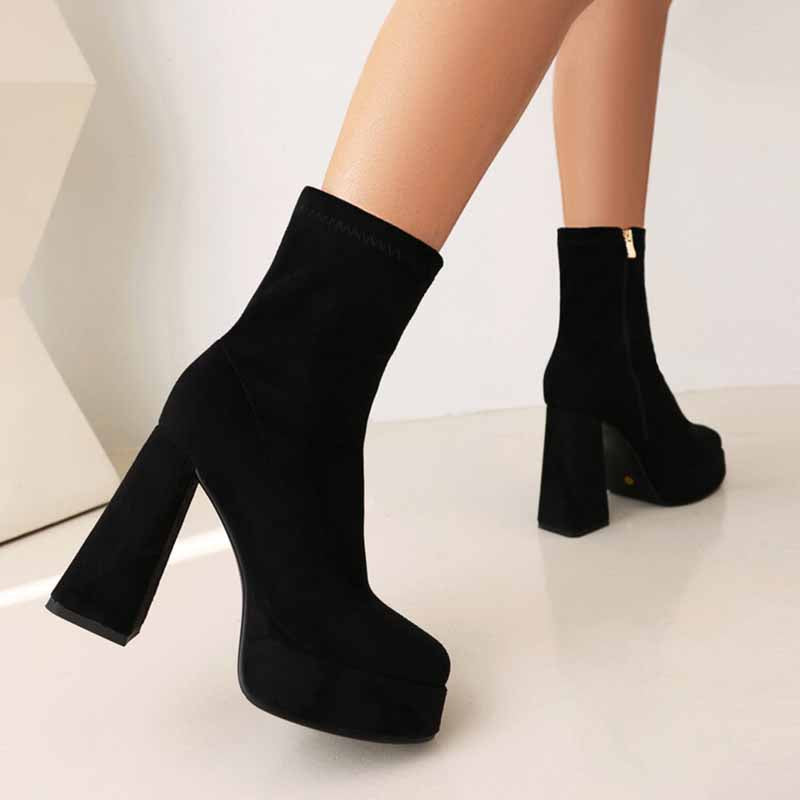 Black chunky heeled boots for women with zipper closure and high platform soles
