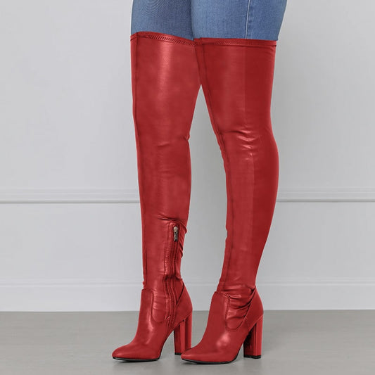 Red chunky heeled over the knee boots with side zipper and block heel on model
