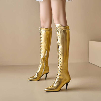 Gold tall lace up heeled boots for women with pointed toes and slim heels