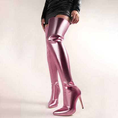 Shiny leather high heel over the knee boots for women in metallic pink worn with a black dress