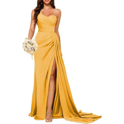 Yellow floor-length one shoulder bridesmaid dress with thigh slit and flowing train