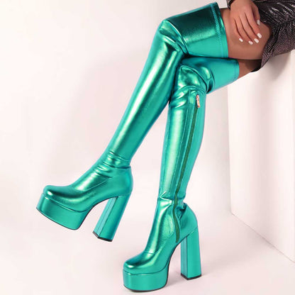 Shiny faux leather boots women in metallic teal with platform heels and side zipper detail