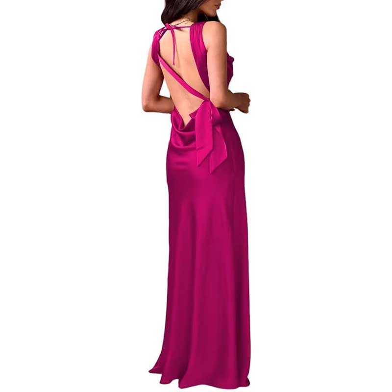 Back view of magenta spaghetti strap bridesmaid gown with open back and bow detail