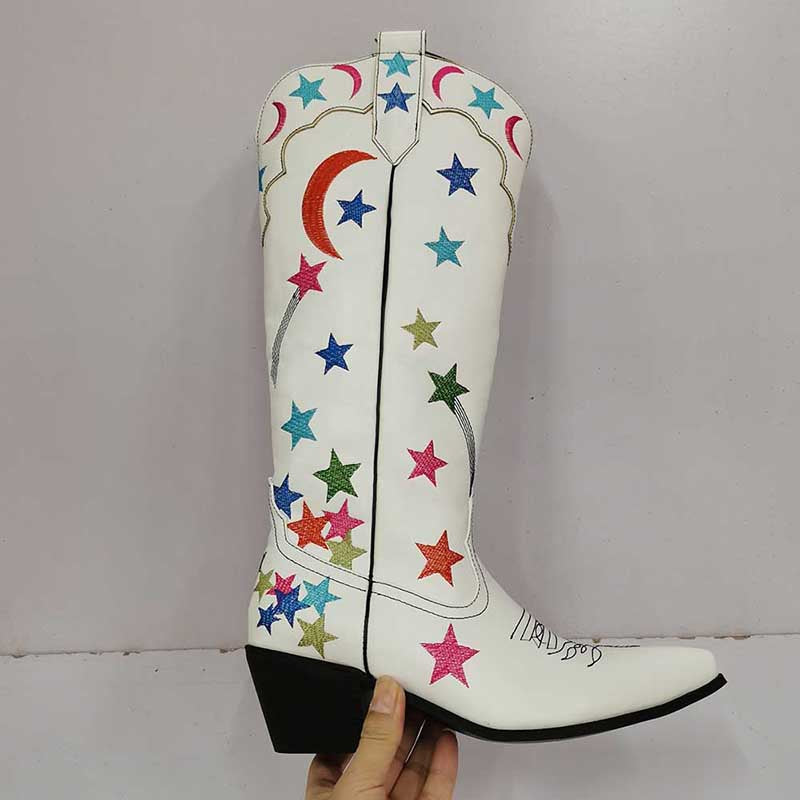 White star pattern knee high boots with multicolor star and moon designs and black block heel