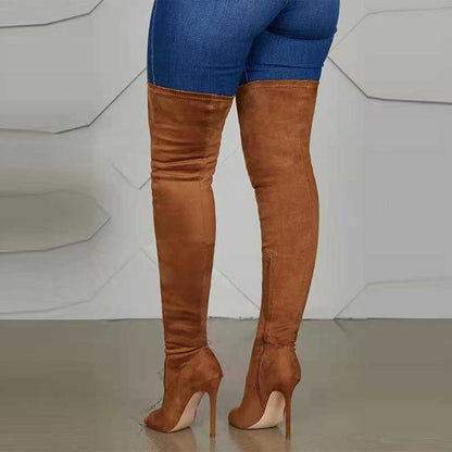 Brown suede high heeled over the knee boots for women paired with blue skinny jeans