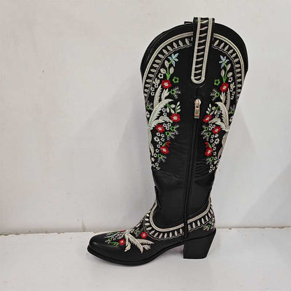 Black women's embroidered cowboy boots with colorful floral embroidery and side zipper